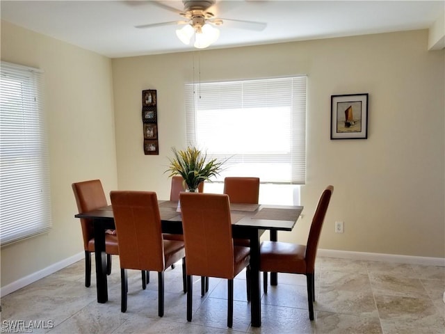 dining room with ceiling fan