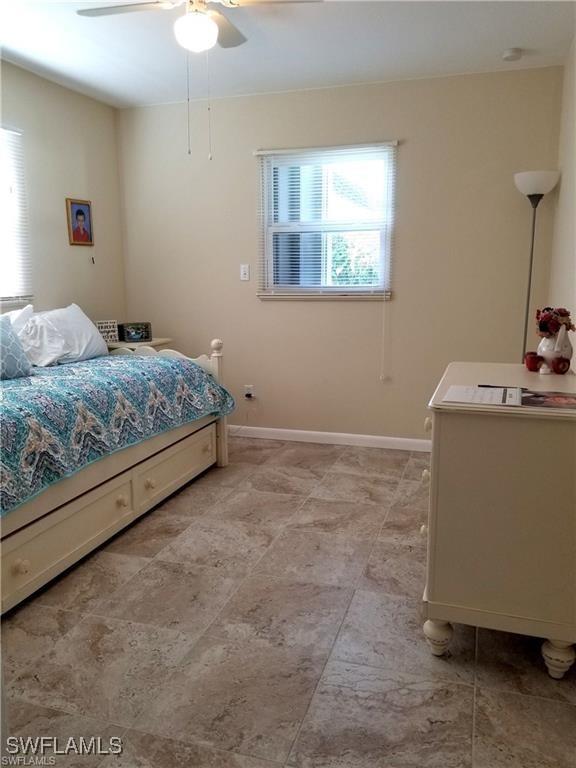 bedroom featuring ceiling fan