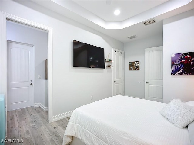 7684 County Rd 78, Fort Denaud, FL 33935 - bedroom with baseboards, recessed lighting, visible vents, and light wood-style floors