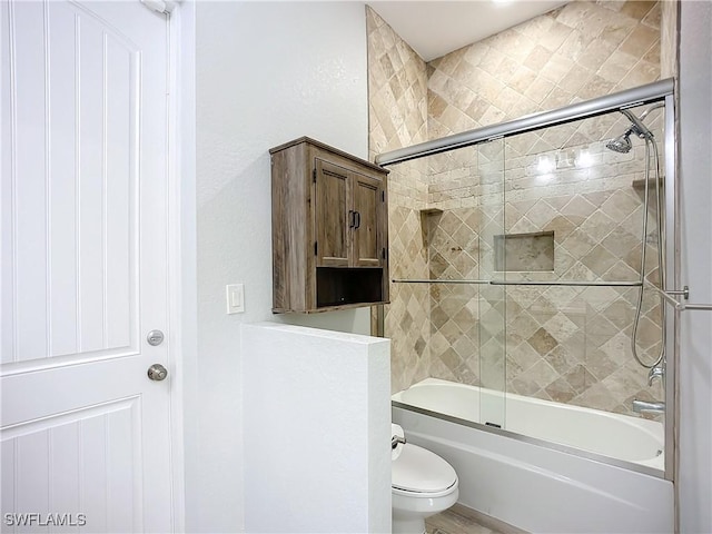 7684 County Rd 78, Fort Denaud, FL 33935 - full bathroom with toilet and shower / bath combination with glass door