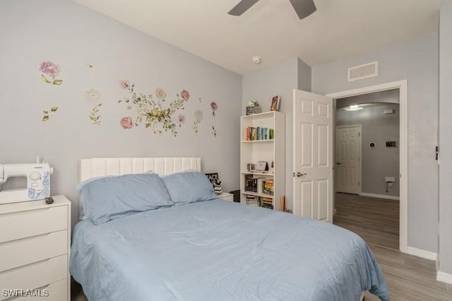 bedroom featuring ceiling fan and light hardwood / wood-style flooring