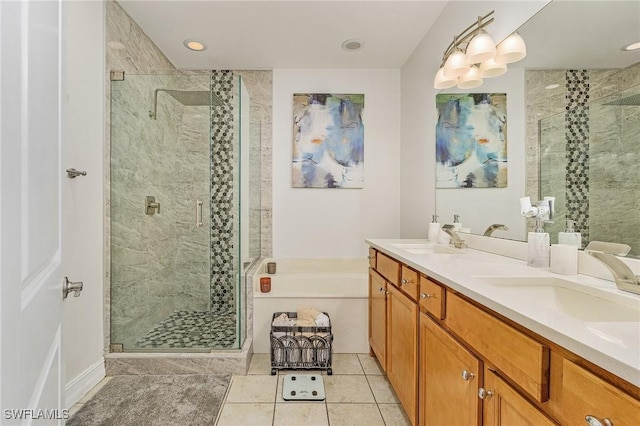 bathroom with tile patterned flooring, vanity, and an enclosed shower