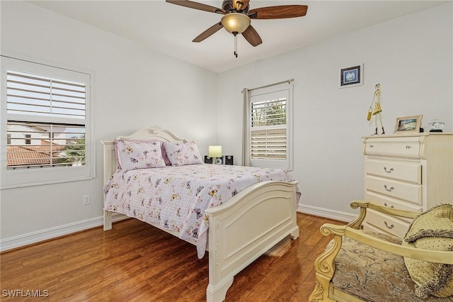 bedroom featuring hardwood / wood-style flooring and ceiling fan