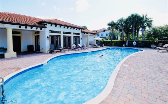 view of pool with a patio