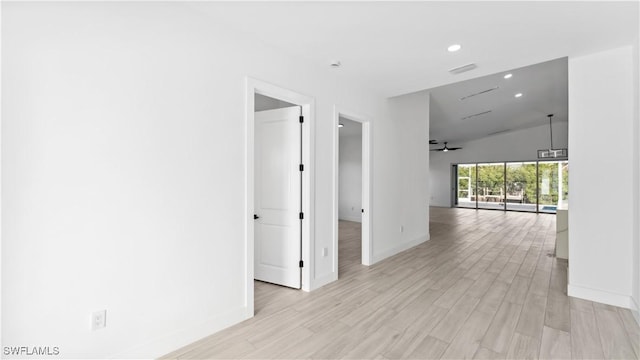 corridor featuring light hardwood / wood-style flooring