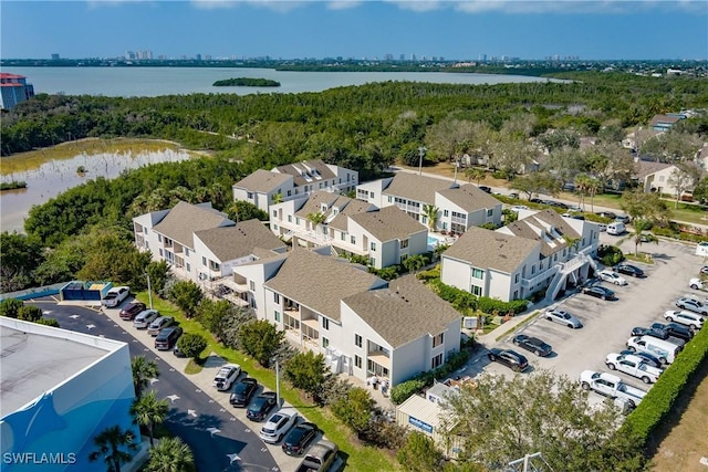 drone / aerial view with a water view