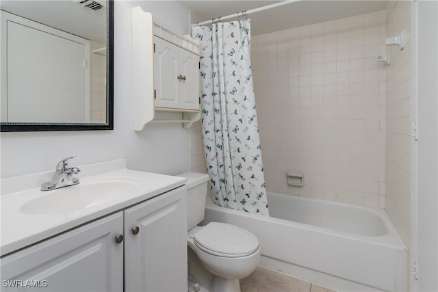 full bathroom featuring vanity, tile patterned floors, toilet, and shower / bathtub combination with curtain