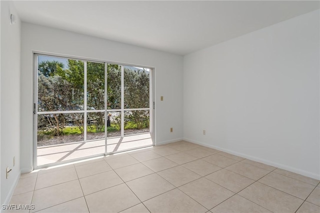 view of tiled spare room