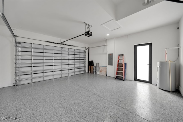 2125 Trafalgar Pkwy, Cape Coral, FL 33991 - garage with gas water heater, a garage door opener, and electric panel