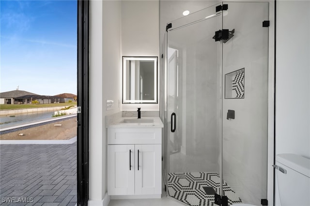 2125 Trafalgar Pkwy, Cape Coral, FL 33991 - full bath featuring a stall shower, vanity, and toilet