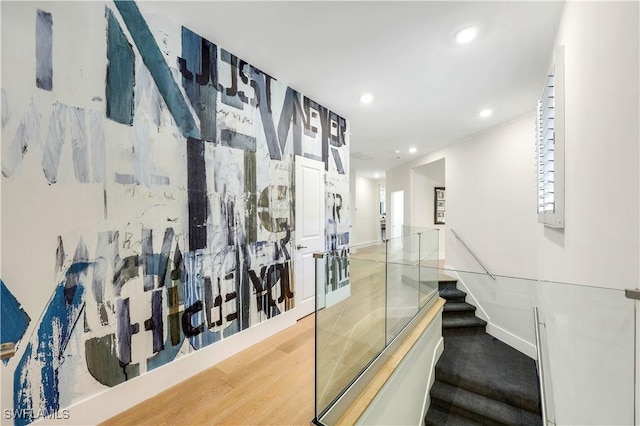 stairs featuring wood-type flooring