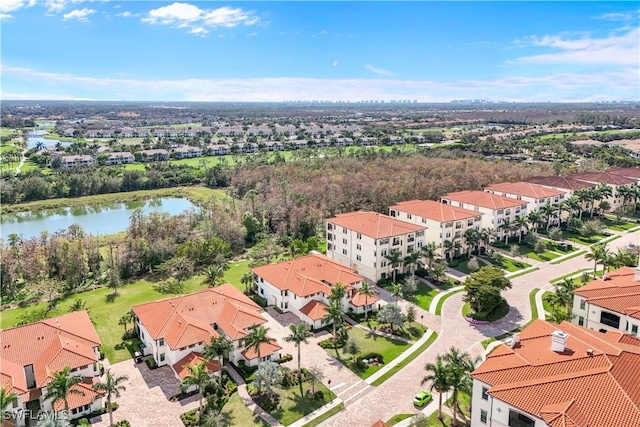 drone / aerial view with a water view