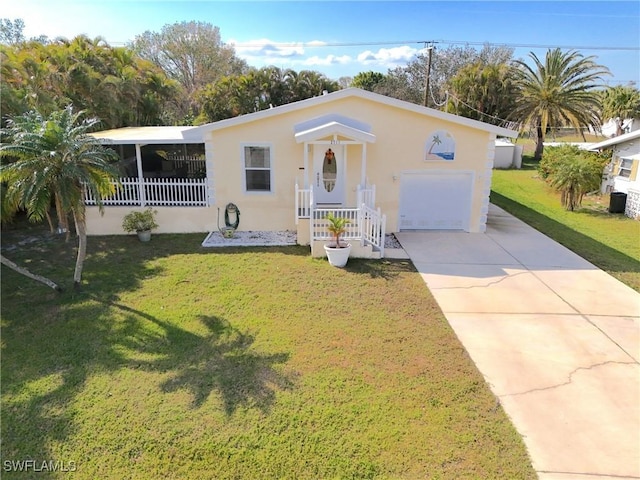 2711 Larkspur Dr, Punta Gorda, FL 33950 - view of front of home with stucco siding, a front yard, and driveway