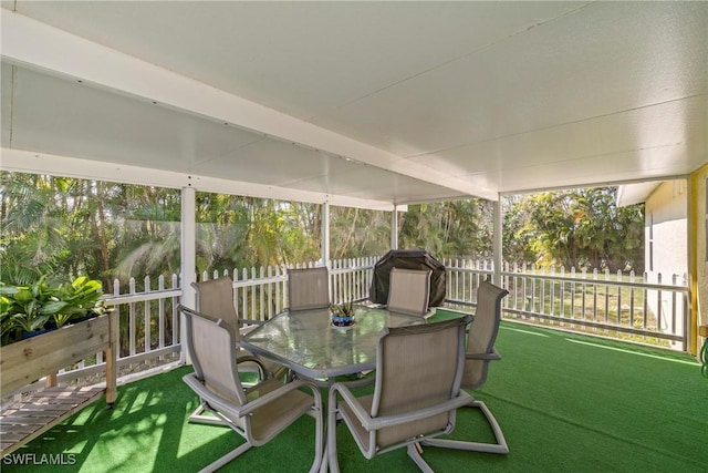 sunroom featuring plenty of natural light