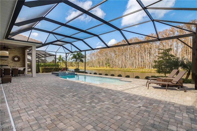 view of swimming pool with a water view, an in ground hot tub, a lanai, and a patio area