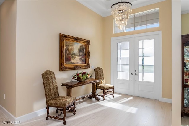 interior space featuring a chandelier and french doors