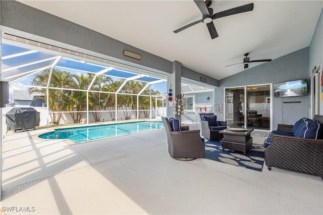 view of swimming pool featuring outdoor lounge area, grilling area, a lanai, and a patio