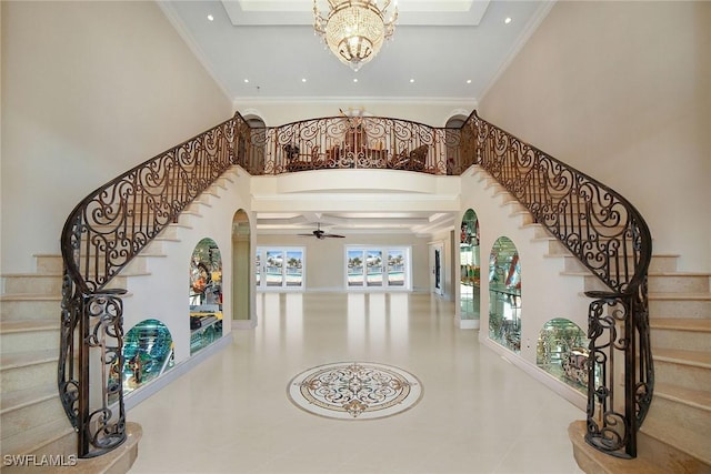 342 Germain Ave, Naples, FL 34108 - tiled foyer entrance featuring stairway, a chandelier, recessed lighting, a skylight, and a high ceiling
