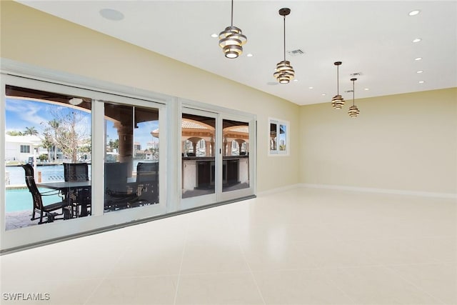342 Germain Ave, Naples, FL 34108 - unfurnished room featuring visible vents, recessed lighting, light tile patterned floors, and baseboards