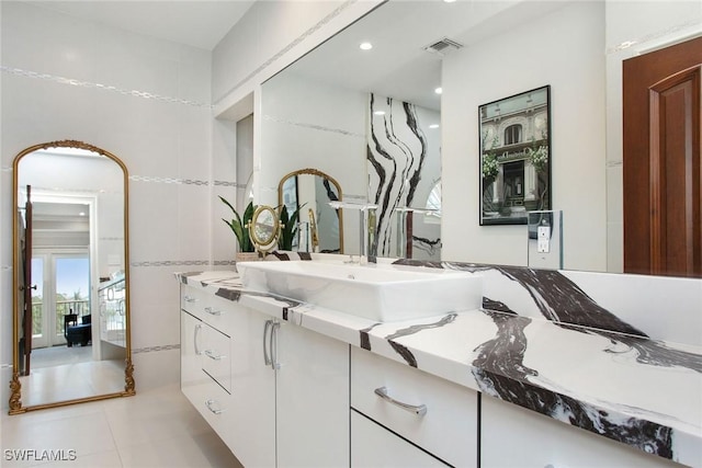342 Germain Ave, Naples, FL 34108 - bathroom featuring visible vents, tile patterned flooring, and vanity
