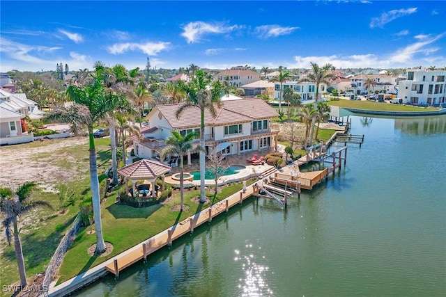 342 Germain Ave, Naples, FL 34108 - exterior space with a balcony, a residential view, a gazebo, a water view, and a yard