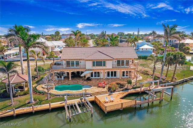 342 Germain Ave, Naples, FL 34108 - rear view of house with a gazebo, stairs, a water view, and boat lift