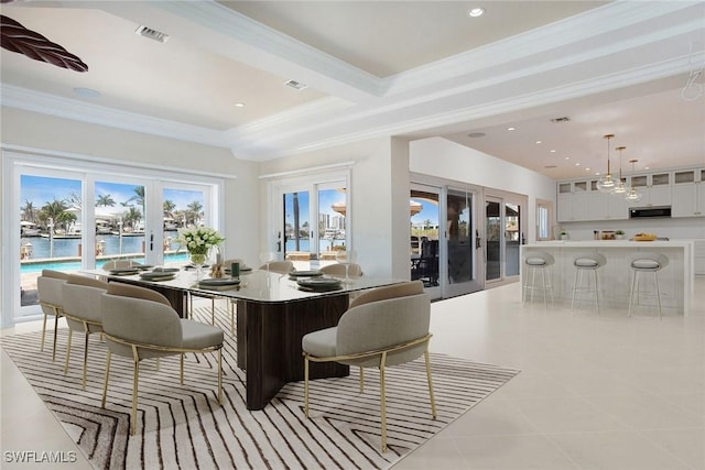342 Germain Ave, Naples, FL 34108 - dining space with crown molding, recessed lighting, visible vents, and a water view
