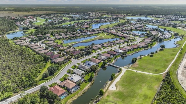 aerial view with a water view and a residential view