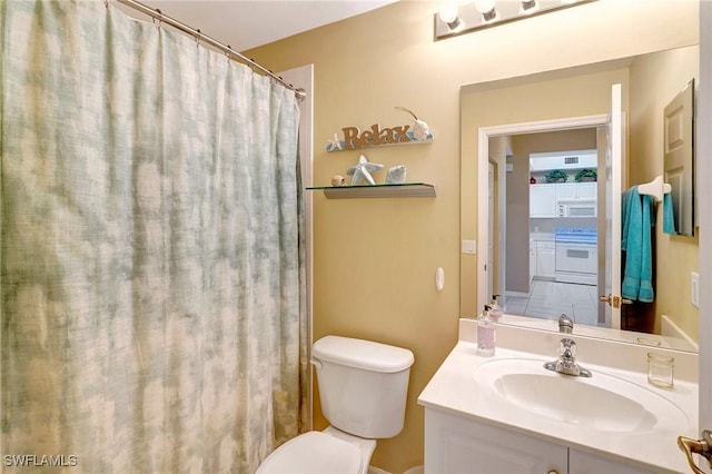 bathroom with vanity and toilet