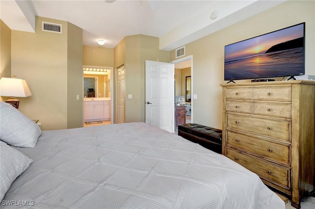 bedroom featuring connected bathroom