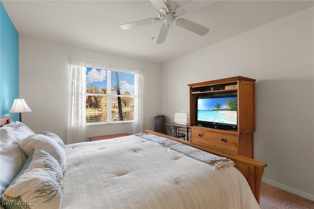 bedroom featuring ceiling fan and carpet flooring