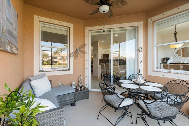 view of patio featuring ceiling fan