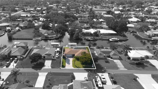 drone / aerial view featuring a water view