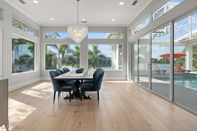 4306 Sanctuary Way, Bonita Springs, FL 34134 - sunroom / solarium featuring a notable chandelier, visible vents, and a wealth of natural light