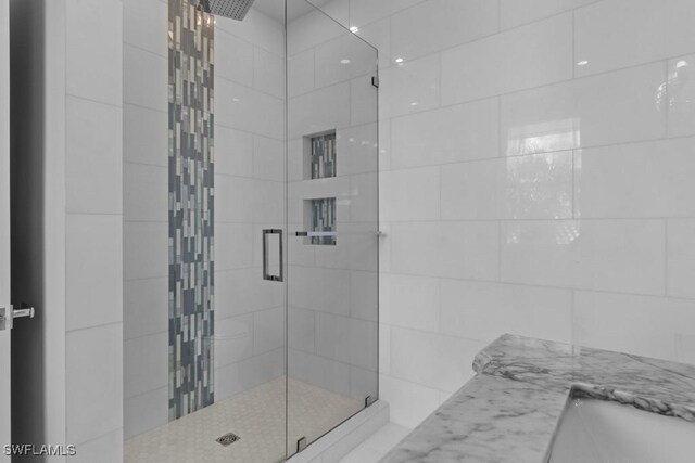 4306 Sanctuary Way, Bonita Springs, FL 34134 - full bathroom with a stall shower and a sink