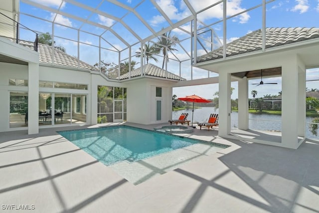 4306 Sanctuary Way, Bonita Springs, FL 34134 - view of swimming pool featuring a patio, a pool with connected hot tub, a water view, and glass enclosure