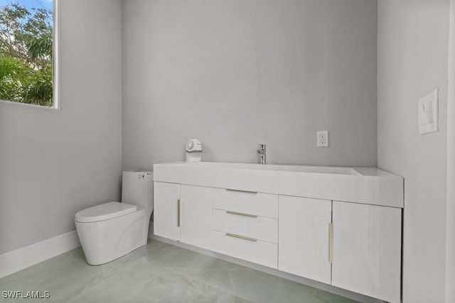 4306 Sanctuary Way, Bonita Springs, FL 34134 - half bath with toilet, baseboards, and vanity