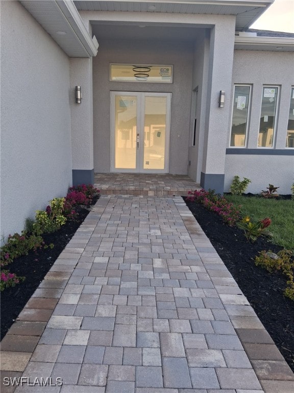 doorway to property featuring french doors