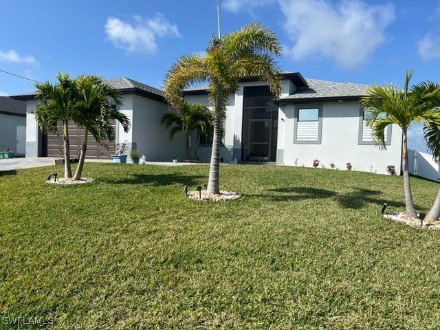 view of front of house with a front lawn