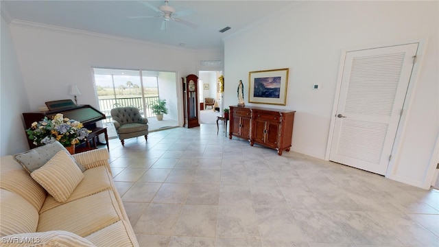 6082 National Blvd Unit 128, Ave Maria, FL 34142 - living room with crown molding, ceiling fan, and light tile patterned floors