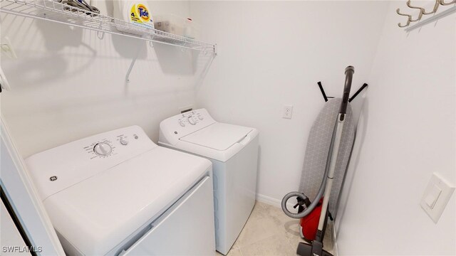 6082 National Blvd Unit 128, Ave Maria, FL 34142 - laundry room featuring separate washer and dryer