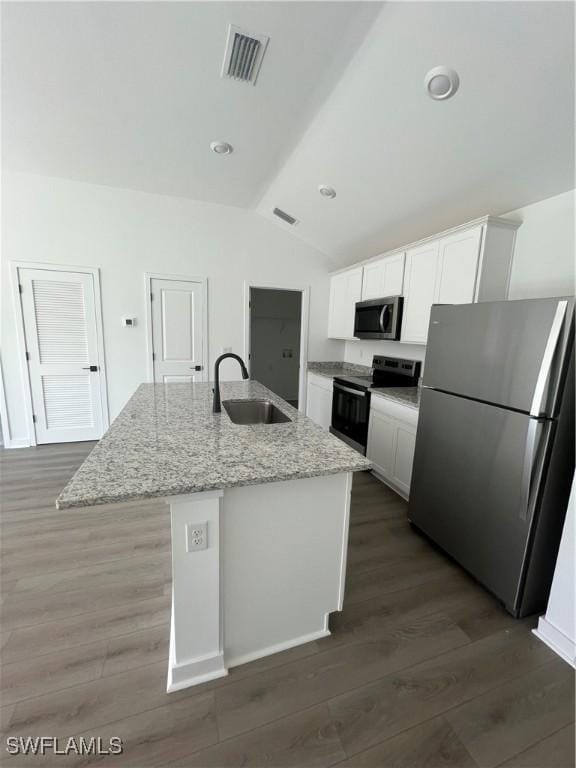 kitchen with a kitchen island with sink, sink, white cabinetry, and appliances with stainless steel finishes