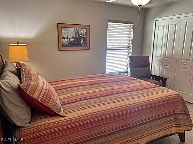 bedroom with a closet and ceiling fan