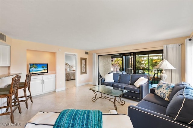 living room featuring light tile patterned floors