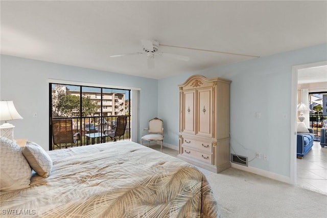 bedroom featuring multiple windows, access to outside, light colored carpet, and ceiling fan