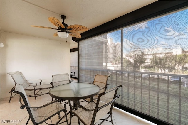 sunroom / solarium with ceiling fan