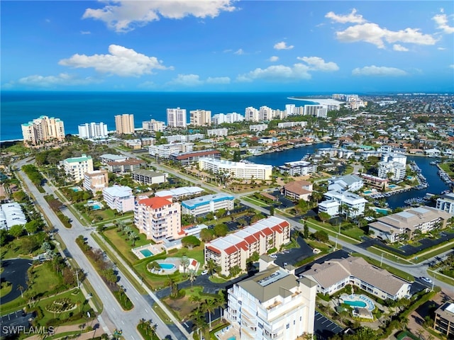 birds eye view of property featuring a water view