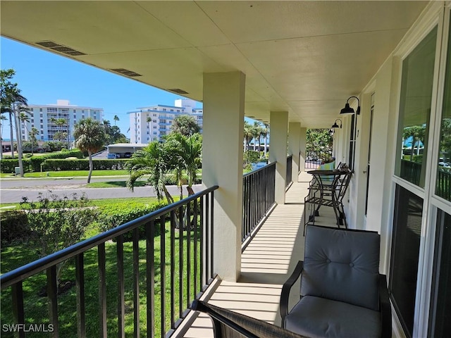 balcony featuring visible vents and a view of city