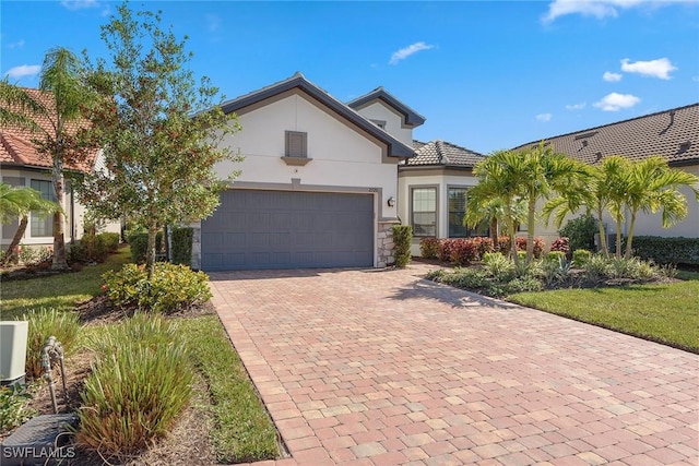 2720 Amaranda Ct, Naples, FL 34114 - view of front of house featuring a garage