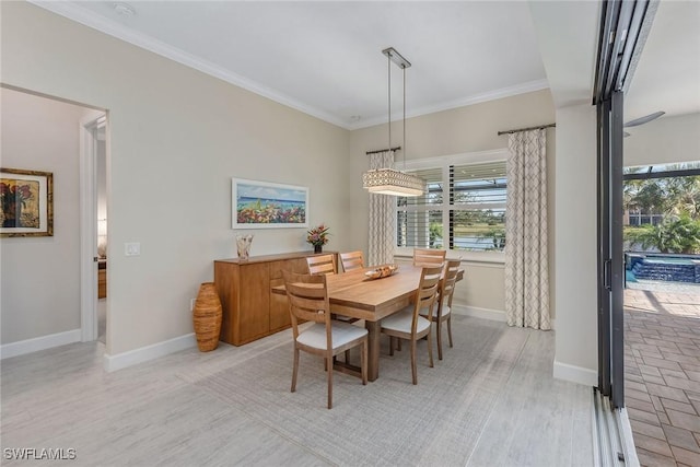 2720 Amaranda Ct, Naples, FL 34114 - dining space featuring ornamental molding and light hardwood / wood-style floors